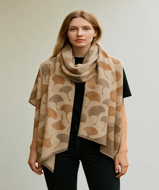 Woman wearing a beige patterned scarf 